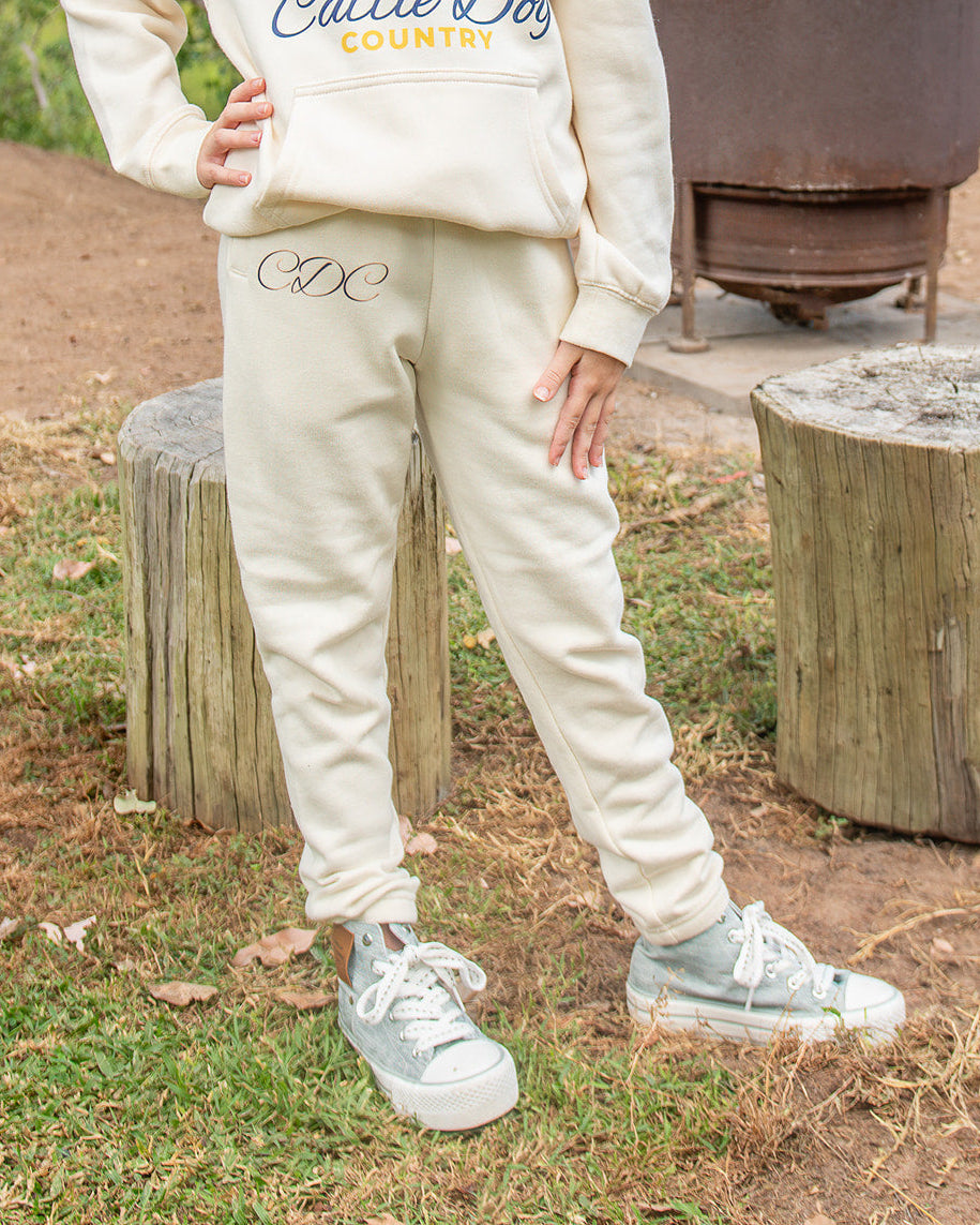 Youth supply track pants ecru